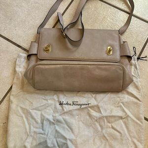 Salvatore Ferragamo bag it’s a taupe color